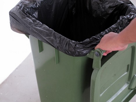 Professional team managing builders waste